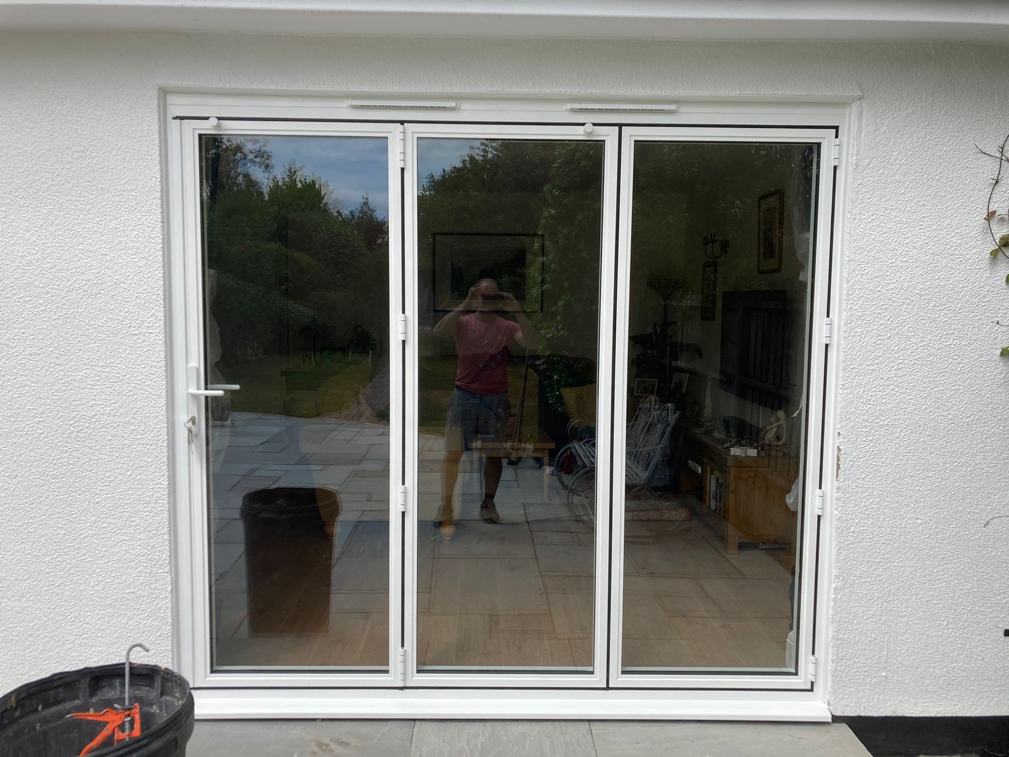 white aluminium bifold doors essex