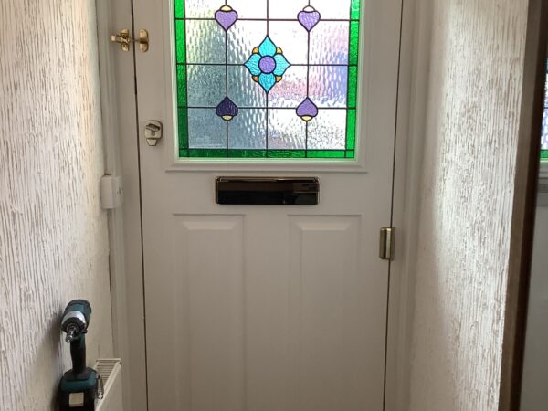 patterned square front door window