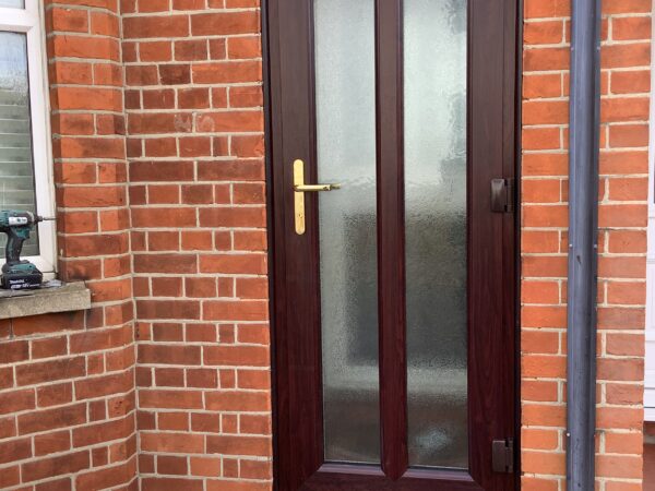 mahogany and misted glass door