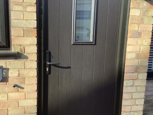 solidor black woodgrain finish door
