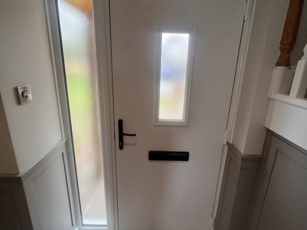 cottage door with black hardware