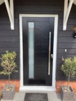 black composite front doors