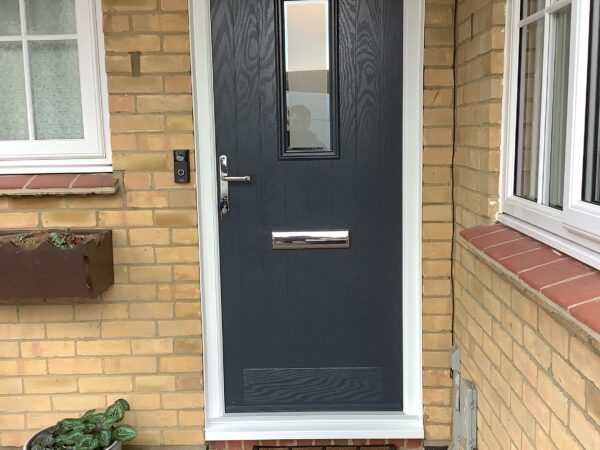 Black door with vertical frosted inserts