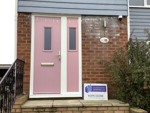 pink door with rectangular window