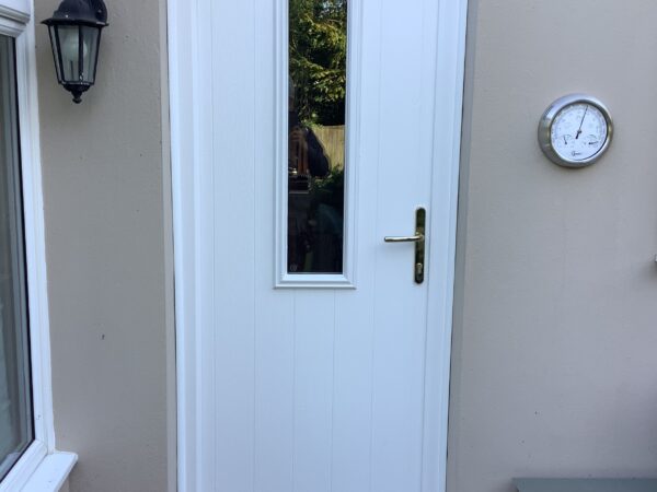White door featuring rectangle glass