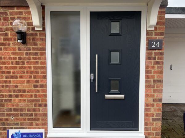 Black door with frosted rectangle