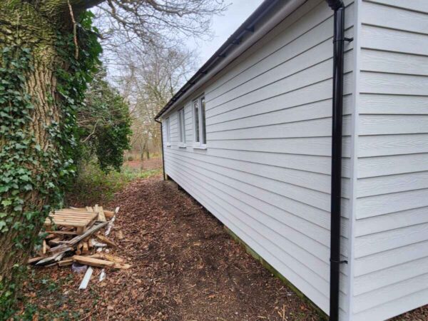 cladding down side of house