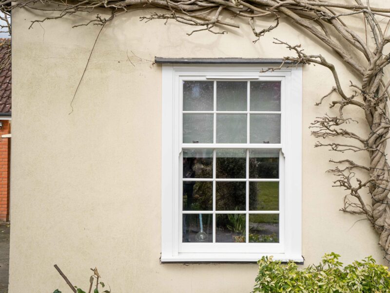 white woodgrain sash windows