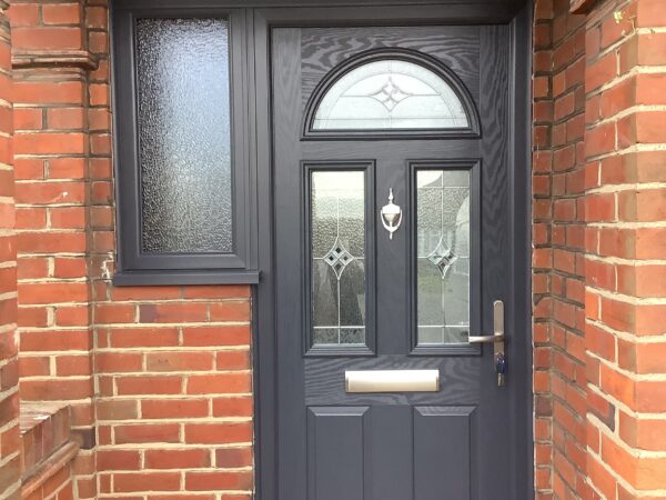front door with detailed glass