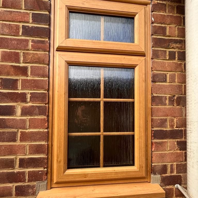 wood grain upvc bathroom window