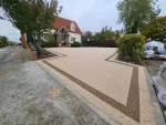 New resin driveway installed at a residential property in Braintree, Essex by Bluemanor Windows.