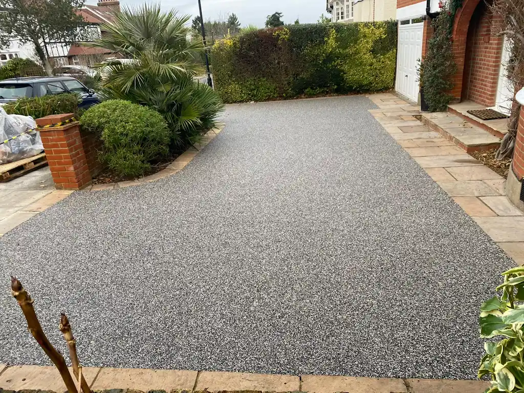 Premium resin driveway installation at a property in Braintree, Essex by Bluemanor Windows.
