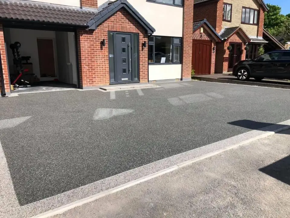 Modern resin driveway completed outside a residential property in Braintree, Essex.