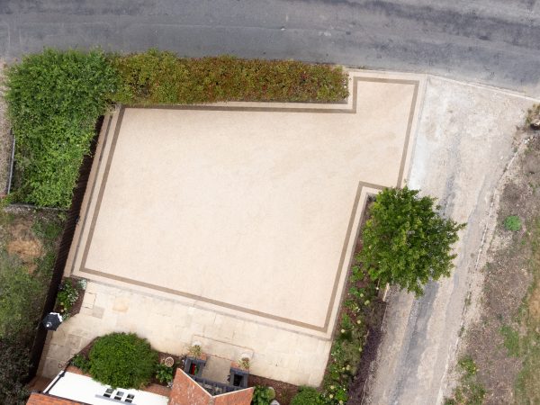 Aerial view of a completed Vuba resin driveway installation by Bluemanor Windows in Essex