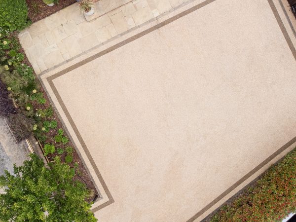 Drone photograph of a Vuba resin driveway installed at a property in Essex by Bluemanor Windows