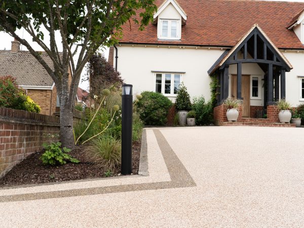 Smooth Vuba resin driveway finish installed by Bluemanor Windows in Essex