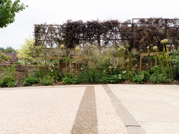 Close-up of Vuba resin bound stone surface border installed in Essex