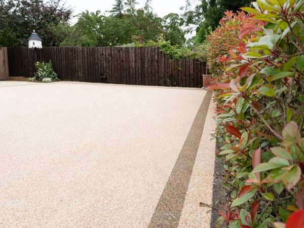 Decorative Vuba resin driveway edging detail during installation in Essex