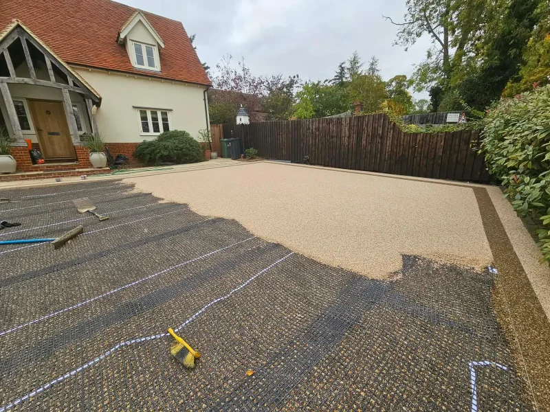 Vuba resin driveway installation underway by Bluemanor Windows in Essex