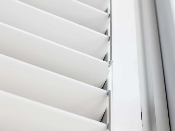 Close-up of Bluemanor Windows plantation shutters with a discreet ClearView hidden tilt mechanism.