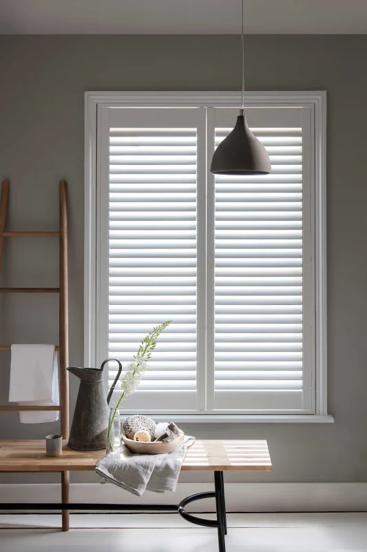 Bluemanor Windows full-height plantation shutters fitted to a home office window.