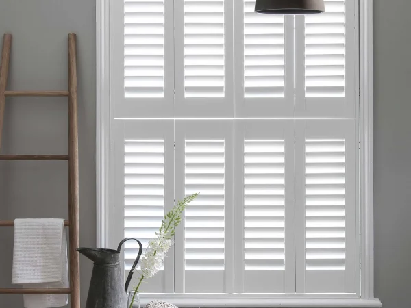 Bluemanor Windows tier-on-tier plantation shutters with the upper panels opened independently.