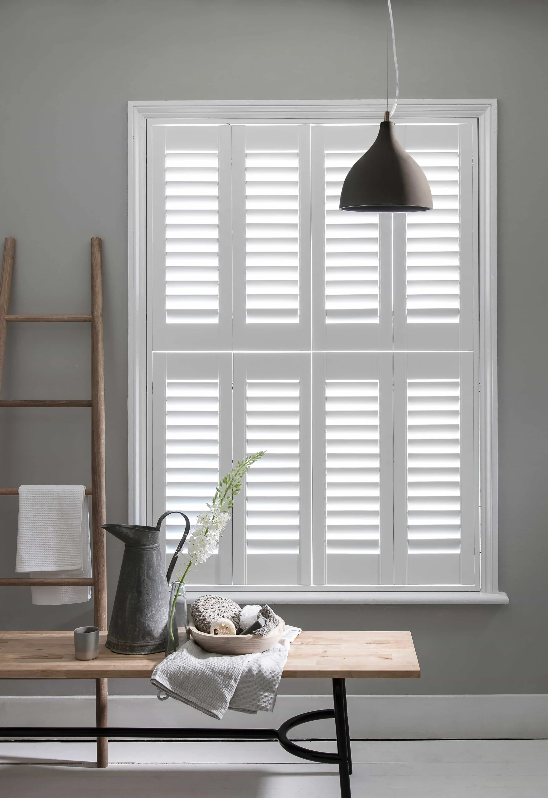 Bluemanor Windows tier-on-tier plantation shutters with the upper panels opened independently.