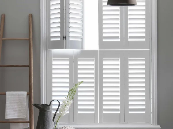 Bluemanor Windows tier-on-tier plantation shutters fitted to a sash-style window.